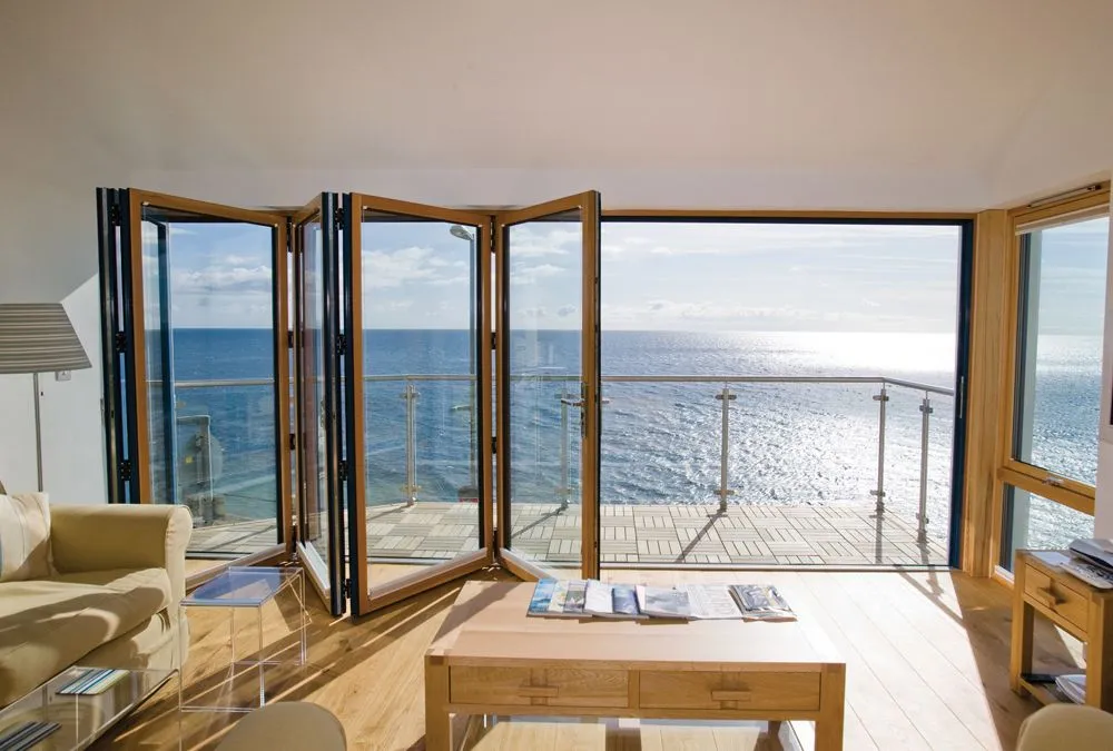 Glass Bi-Fold Doors - Aluminium and Wood - Moving Designs Limited - Example 1